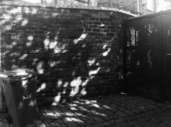 Shadow on brick wall