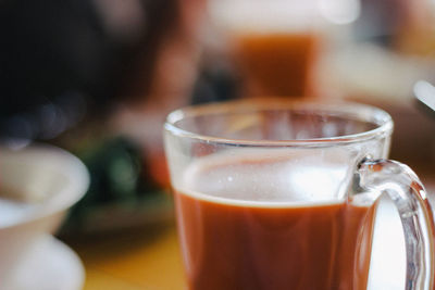 Close-up of coffee cup on table