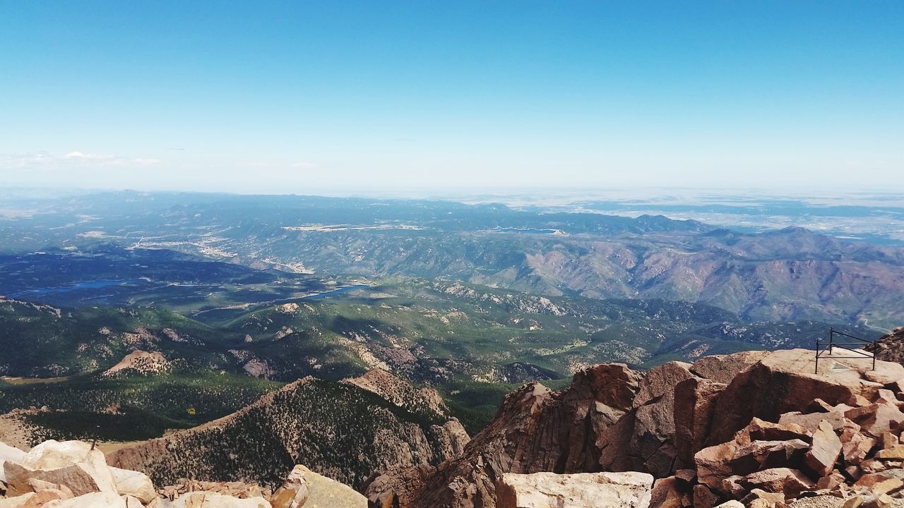 scenics - nature, sky, mountain, beauty in nature, tranquil scene, environment, landscape, non-urban scene, tranquility, nature, day, mountain range, no people, rock, idyllic, copy space, rock formation, clear sky, high angle view, rock - object, outdoors, climate, arid climate