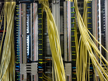 Low angle view of light trails on bridge