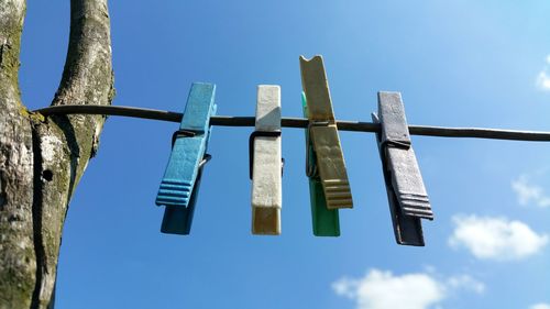 Low angle view of clothespins