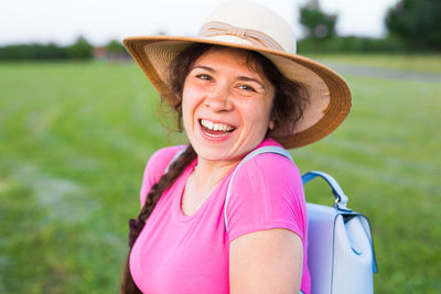 Portrait of woman wearing hat