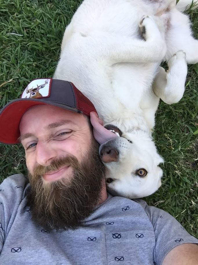 PORTRAIT OF DOG WITH DOG IN BACKGROUND