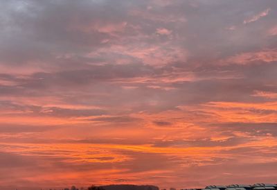 Low angle view of dramatic sky during sunset