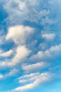 Low angle view of clouds in blue sky