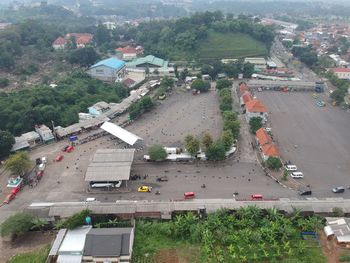 High angle view of street amidst buildings in city
