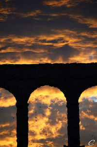 Scenic view of dramatic sky during sunset