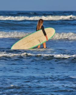 Man surfing in sea