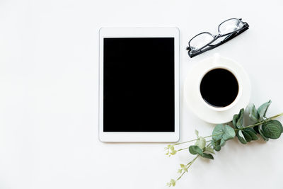 Directly above shot of coffee cup on table