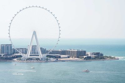 Dubai eye ferris wheel against blue sky