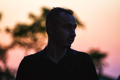 Portrait of a young man looking away