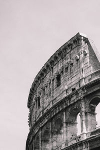 Low angle view of coliseum against sky