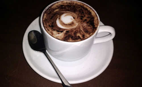 Close-up of cappuccino on table