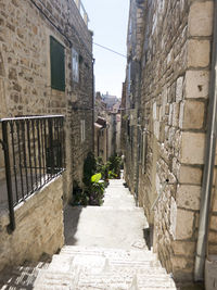 Narrow alley along buildings