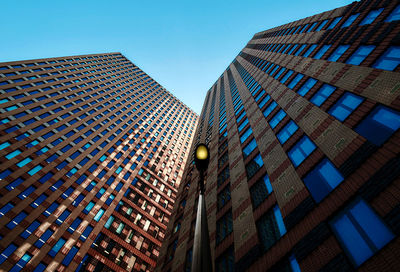 Low angle view of modern building against clear sky