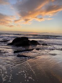 Scenic view of sea against sky during sunset