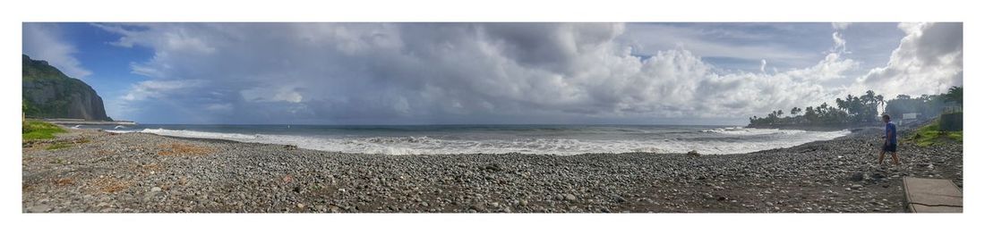 Panoramic view of beach against sky