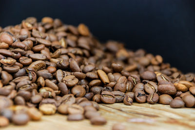 Close-up of coffee beans on table