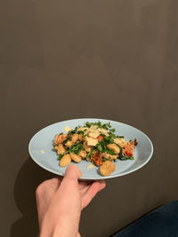 Midsection of person holding food