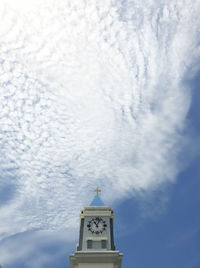 Low angle view of clock tower against sky