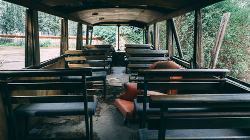 Salon of an old abandoned passenger bus. view from inside of the bus, empty seats