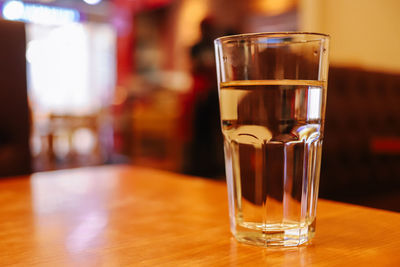 Close-up of beer in glass on table