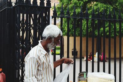 Man selling food outdoors