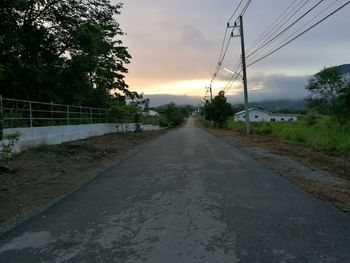 Empty road at sunset