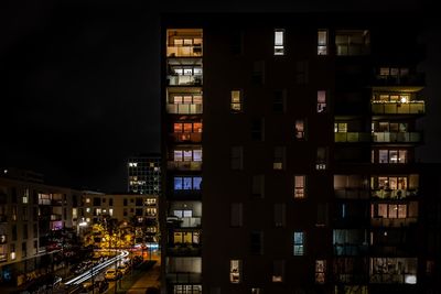 Illuminated buildings in city at night