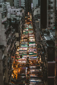 High angle view of illuminated buildings in city