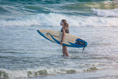 Man surfing in sea