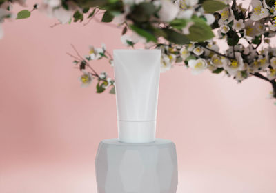 Close-up of white flower vase on table