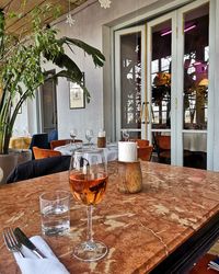 Wine glasses on table at home