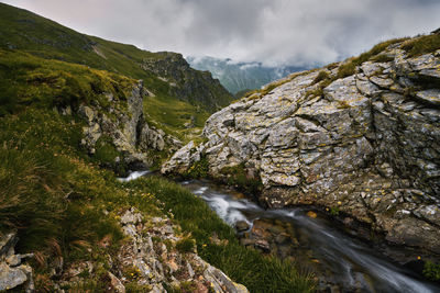 Capture a long time exposure for a waterfall, it accentuates the dynamism of water.