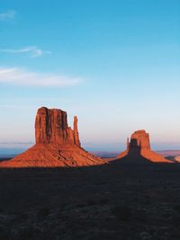 Scenic view of rock formations against sky