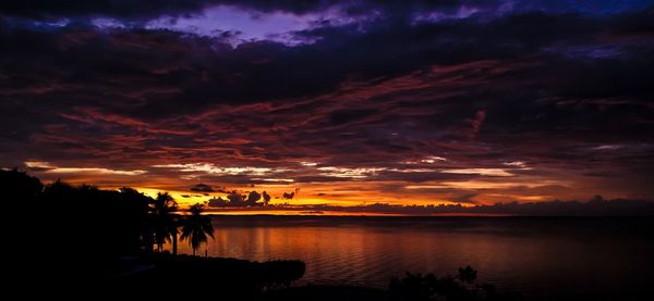 Dramatic sky over calm lake