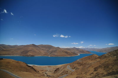 Panoramic view of arid landscape against sky