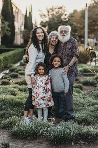 Traditional family portrait of multigenerational family standing