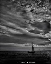 Scenic view of sea against cloudy sky