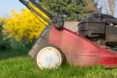 Close-up of machinery on field