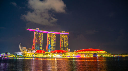 Illuminated city lit up at night