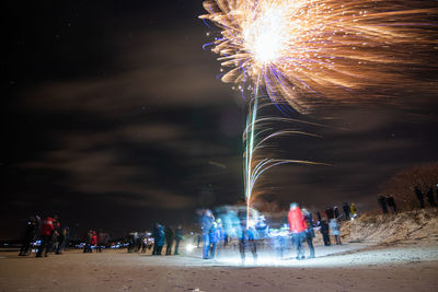 Firework display at night