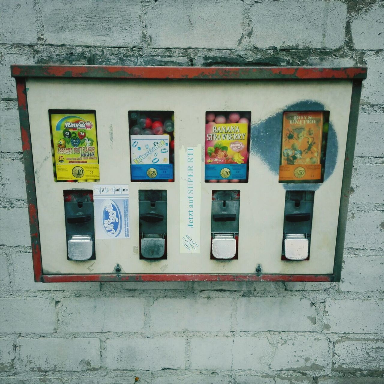 communication, text, western script, technology, number, wall - building feature, transportation, yellow, day, indoors, capital letter, mailbox, wall, no people, metal, built structure, connection, telephone, door, information sign