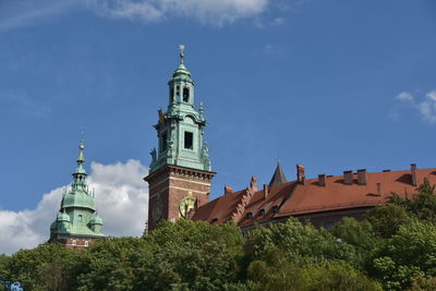 Clock tower of wawel cathedral against sky