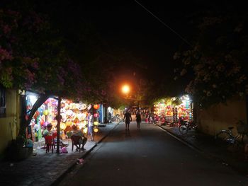 People on street at night