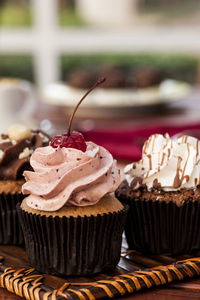 Close-up of cupcakes on table