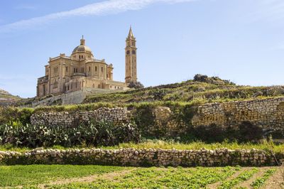 Exterior of historic building against sky