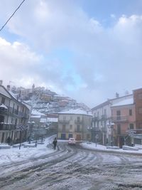 City against sky during winter
