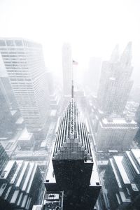 Modern cityscape against sky