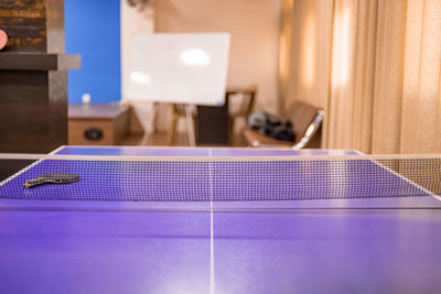 Close-up of blue ball on table